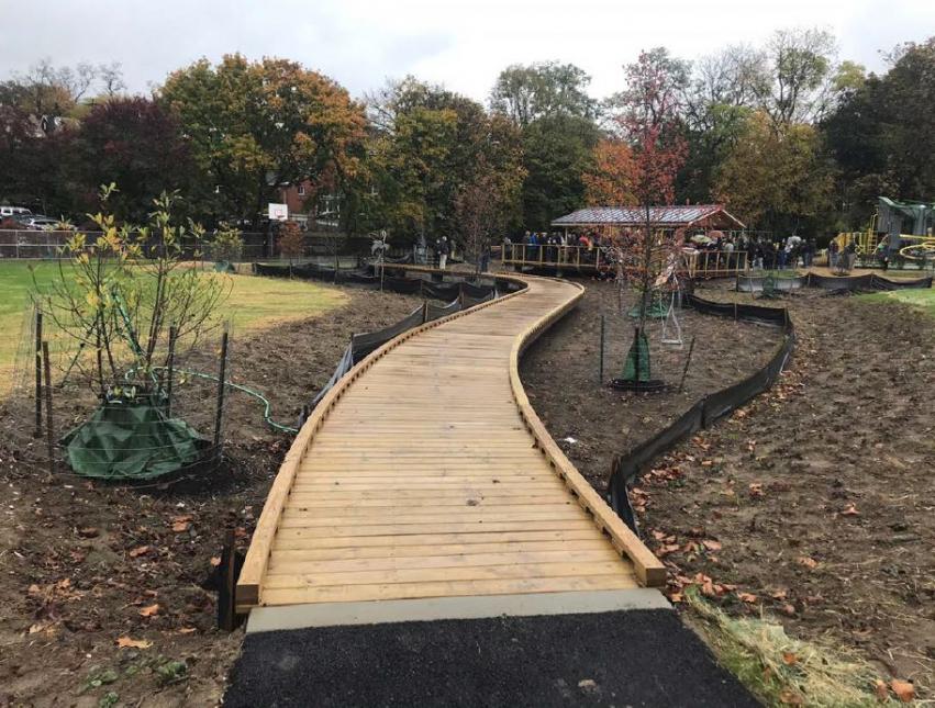 A boardwalk over the new rain garden provides a close view of our stormwater infrastructure at work. 