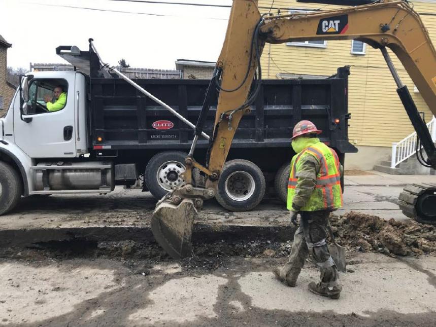 Crews replacing a water main in a Pittsburgh neighborhood. 