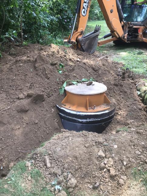 PWSA crews uncover a sewer manhole in Rodgers Street