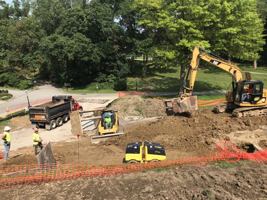 PWSA contractors constructing a dry stream bed at Chatham University. Other projects are currently under construction in Squirrel Hill and Shadyside, and construction will begin on the Thomas and McPherson project in North Point Breeze in August.