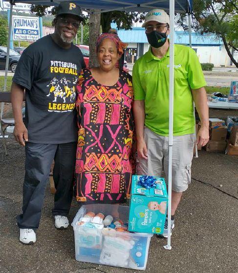 PGH2O Cares Analyst, Michael Anania  (right), with the winner of the Homewood Day of Hope gift basket sponsored by PWSA. 