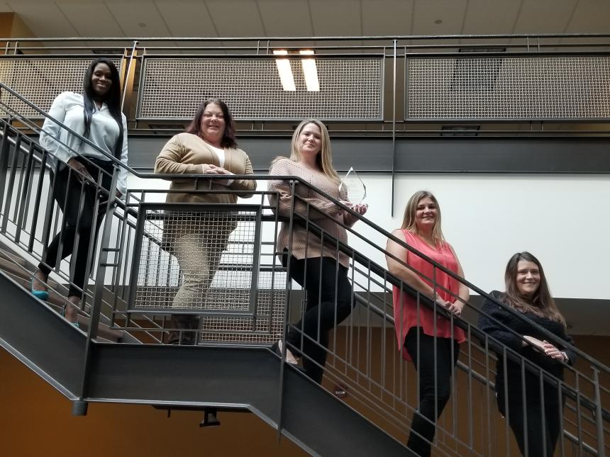 From left: Tishla Jones (Customer Service Manager), Tracy Willy (Senior AMI and Billing Manager), Brittany Schacht (Senior PUC Compliance Manager), Sharon Gottschalk (Senior Collections Manager), and Crystal Thurston (AMI and Billing Manager).
