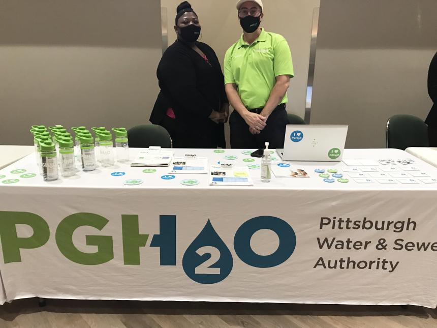 From left: PGH2O Cares Analysts, Rebecca Copney and Michael Anania hosting our information tables at community events.
