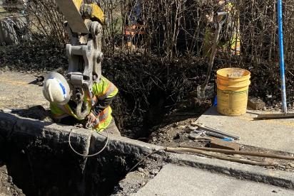Construction crews on Hazelwood Avenue remove the 10,000th lead service line.