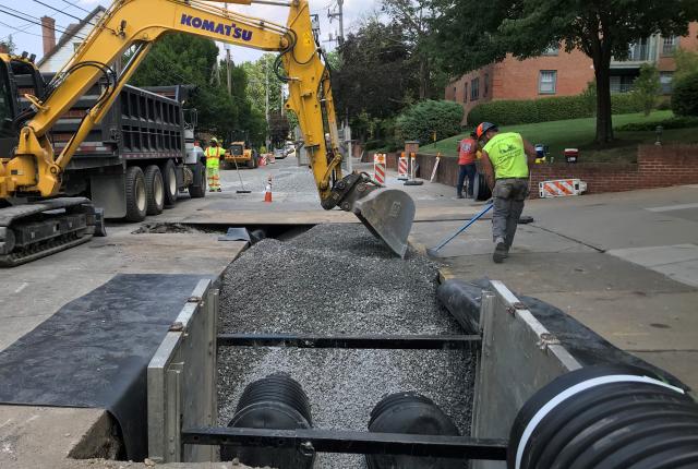 Contractor installing portion of underground storage on Kentucky Avenue in Shadyside's Maryland Avenue Stormwater Project.