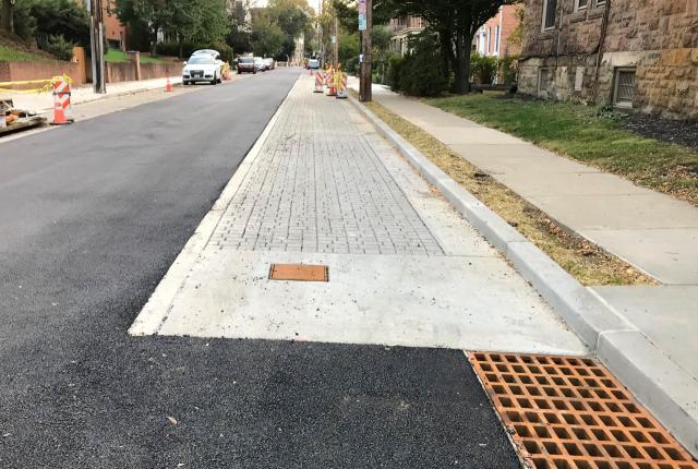 Fresh asphalt and permeable pavers on Kentucky Avenue this fall for the Maryland Avenue Project.
